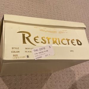 Restricted black boots